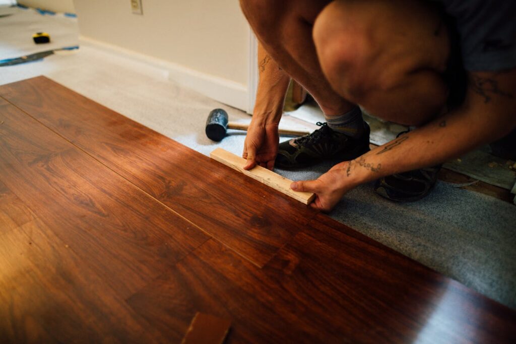 image of flooring contractor installing a new floor